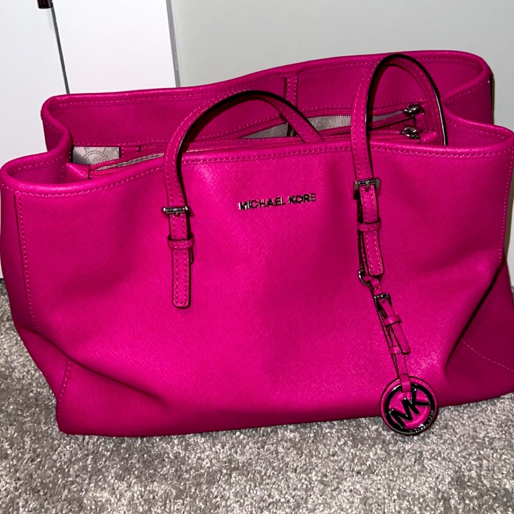 Michael Kors pink purse.